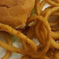 Texas Burger · Hamburger with BBQ sauce, fried onion rings and Cheddar cheese. Consuming raw or undercooked...