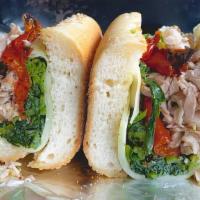 Italian Roasted Pork · Sautéed broccoli rabe, roasted peppers & melted sharp provolone with fries or salad. Add ita...