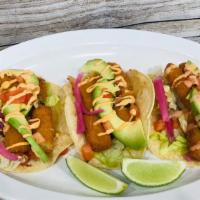 Fish Tacos · Fried cod, slaw, slaw, lettuce, pickled onions, tomatoes, cilantro, chipotle aioli, avocado....