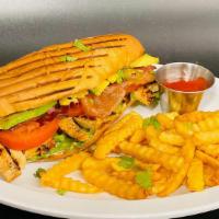 Fried-Ranch Chicken Sandwich · Lightly bread chicken breast, lettuce, tomatoes, apple wood smoked bacon, cheese, onions, ra...