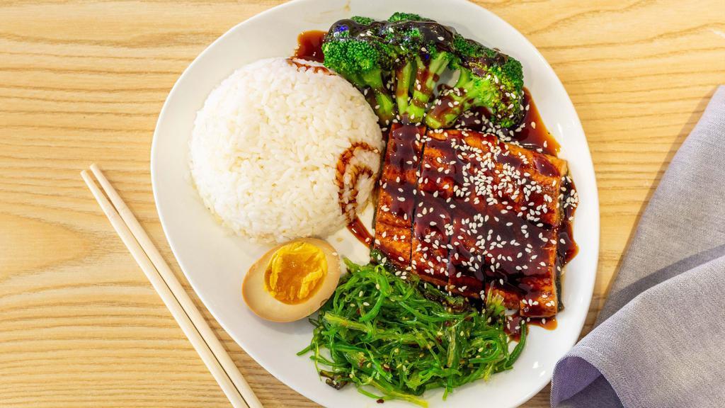Grill Eel Over Rice · Consuming raw or undercooked meats, poultry, seafood, shellfish, or eggs may increase the risk of foodborne illness. Before placing your order, please inform your server if a person in your party has a food allergy.