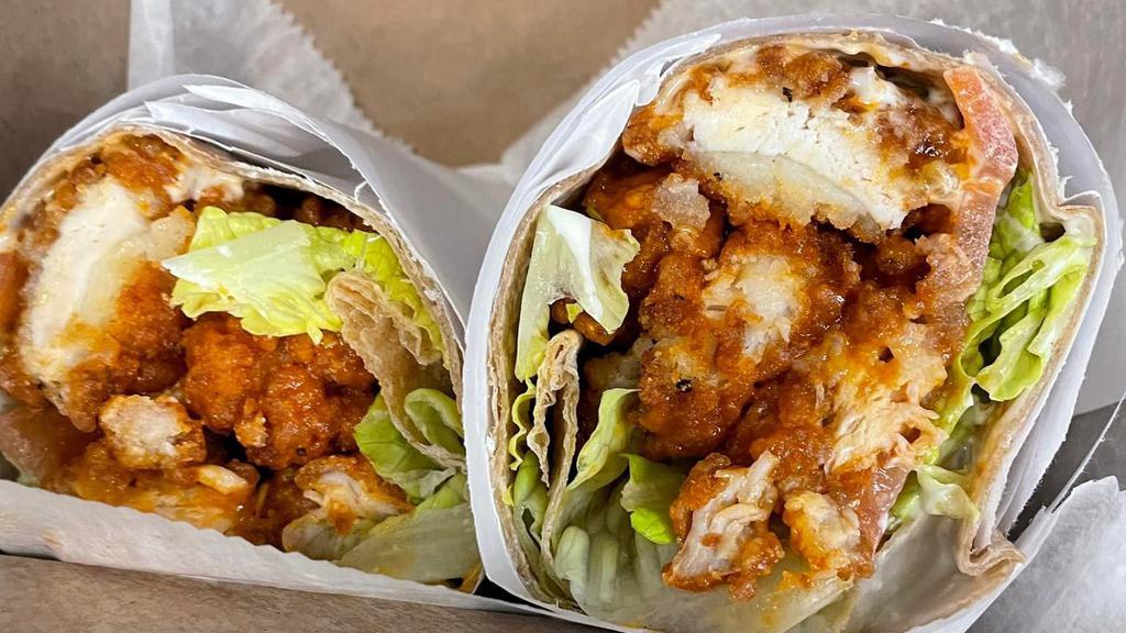 Buffalo Chicken · Grilled or fried with lettuce, tomatoes and blue cheese.