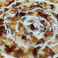 The Amsterdam 110Th · Fried chicken, bacon, tomatoes, mozzarella topped with ranch drizzle. No pizza sauce.