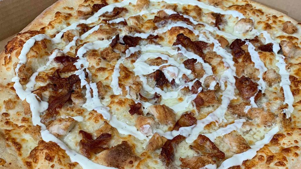 The Amsterdam 110Th · Fried chicken, bacon, tomatoes, mozzarella topped with ranch drizzle. No pizza sauce.