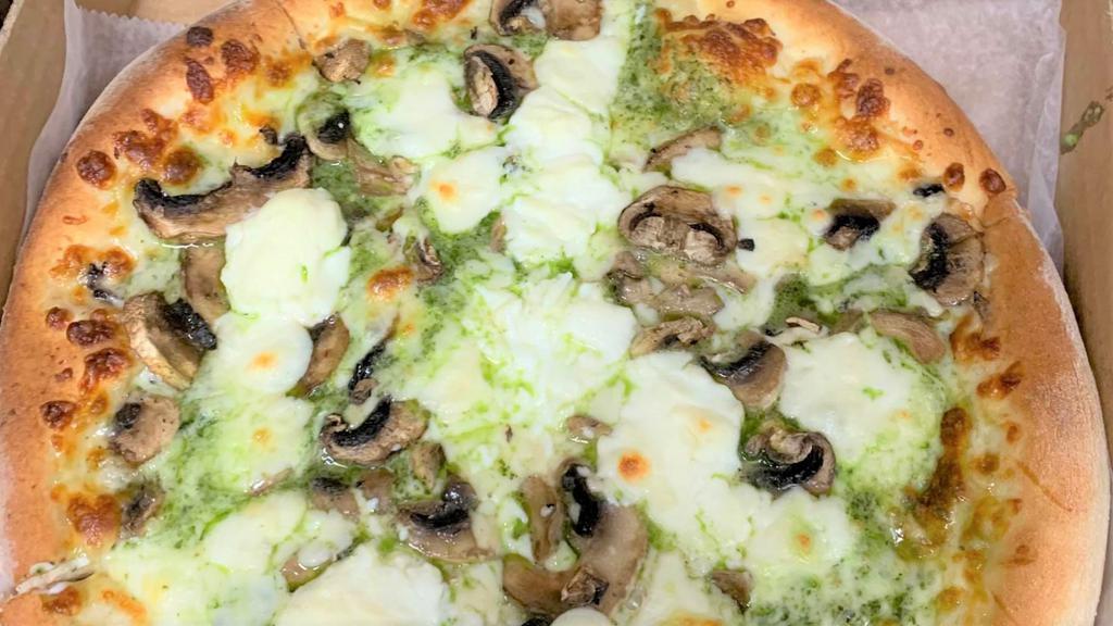 Genovese · Pesto, ricotta, fresh and mozzarella, mushrooms. No pizza sauce.