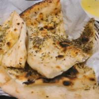 Focaccia Bread · Our organic house made dough pressed flat and baked with extra virgin olive oil, oregano, an...