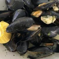 Impepata Di Cozze · Steamed Blue mussels with extra virgin olive oil, parsley and crushed black pepper.