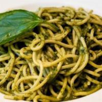 Spaghetti Al Pesto · Imported organic Spaghetti noodles served in a Basil Pesto sauce .