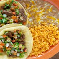Tacos Carne Asada Combo · Tender pieces of beef, sauteed with fresh cilantro, onion, tomato and peppers.