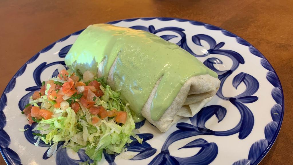 Southwest Burrito  · Filled with grilled chicken, black beans, pico de gallo, grilled corn, cilantro lime rice, topped with lettuce and drizzled cilantro lime cream dressing