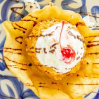 Fried Ice Cream · breaded scoop of ice cream that is quickly deep-fried in a crispy shell around the still-col...
