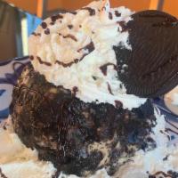 Cookies And Cream Fried Ice Cream  · A Oreo Inspired Fried Ice cream topped with whipped cream and chocolate syrup