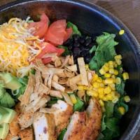 Southwest Salad  · Grilled chicken breast, black beans, tomato, grilled corn, avocado,
shredded cheese, chives,...