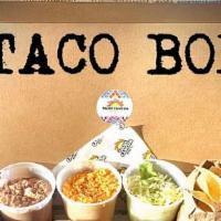 Taco Box  · Family meal which includes: 
Chicken and Ground beef, Tortillas, Lettuce, Tomatoes, Shredded...
