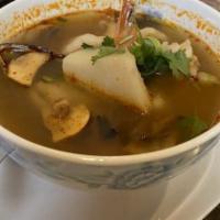 Tom Yum · Thai style hot and sour soup with choice of chicken or shrimp or tofu with chili, lemongrass...