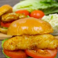 Classic Cod Fish Sandwich · This is our famous Potato Encrusted Cod on a fresh. Brioche bun with lettuce, tomato, and ta...