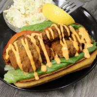 Breaded Oyster Poboy · Crispy, tender breaded Chesapeake oysters served on a toasted New England style bun with let...