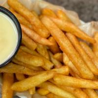 Cheese Fries · Crispy coated French Fries with the Captain's special seasoning, served with a side of our h...