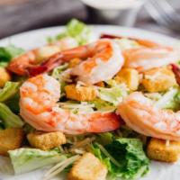 Shrimp Caesar Salad · Our colossal, wild caught shrimp on top of the traditional Caesar fixings – freshly chopped ...
