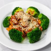 Sesame Chicken · Hot white meat chicken slices sautéed in mild sweet and spicy sauce sprinkled with imported ...