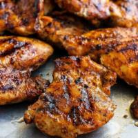 Chicken Kabob · Grilled cuts of seasoned chicken thighs