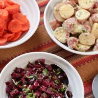 Salad Plate · Choose four from: hummus, Israeli salad, baba ganoush, potato salad, tabouli, eggplant, carr...