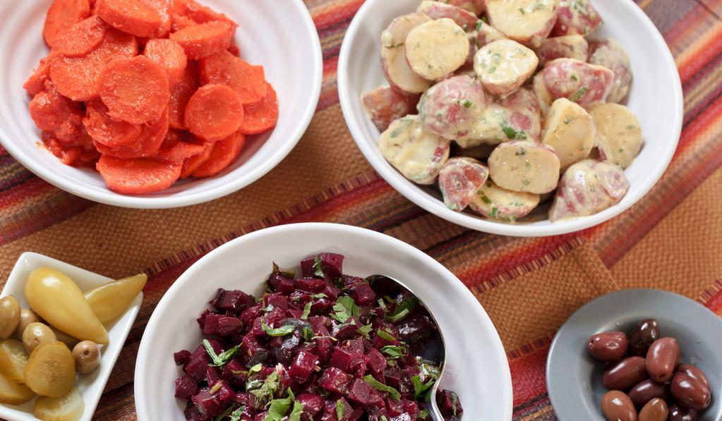 Salad Plate · Choose four from: hummus, Israeli salad, baba ganoush, potato salad, tabouli, eggplant, carrots, cabbage, or beets.