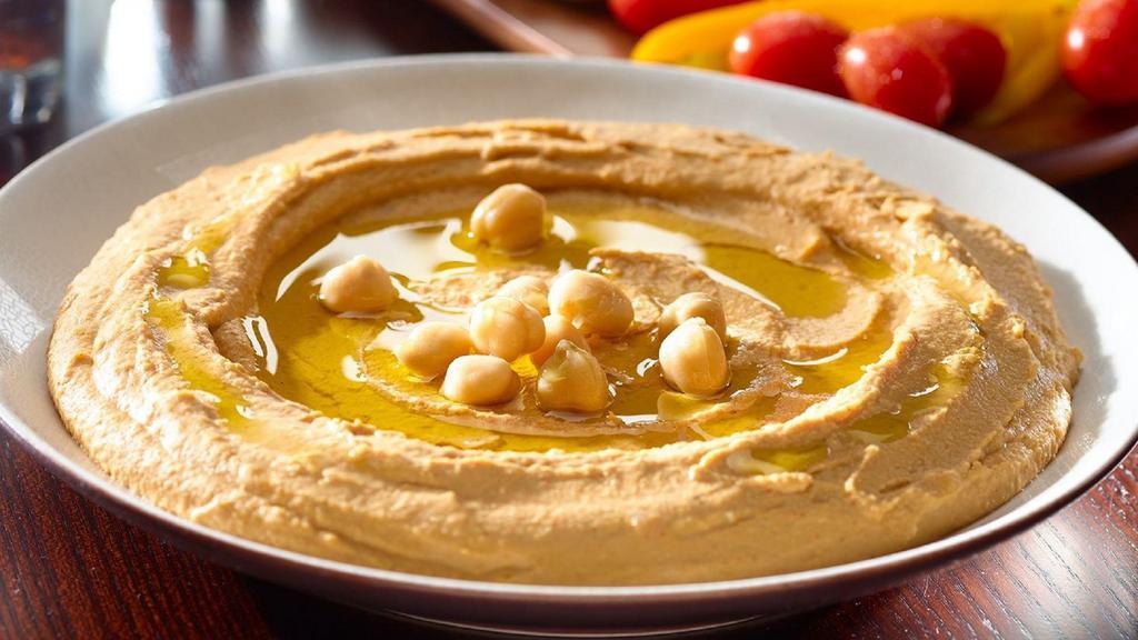 Hummus Plus · Vegan. With crushed garlic or whole chickpeas.
