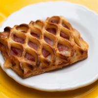 Savory Ham Pastry · Butter, ham, and flakey pastry.