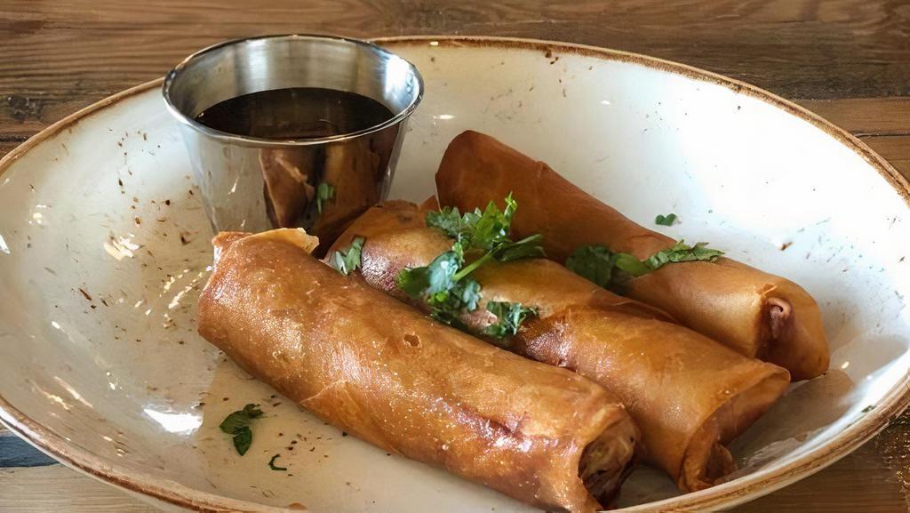 Chicken Spring Rolls · (3) deep fried spring rolls stuffed with ground chicken, cabbage, carrots, onions, cellophane noodles and black mushrooms served with a Vietnamese lime dipping sauce.