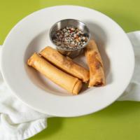 Veggie Spring Rolls · Spring rolls stuffed with cabbage, onions, carrots, mushrooms and cellophane noodles served ...
