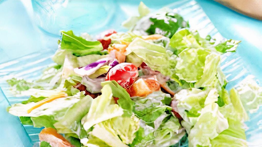 Side Salad · Salami, pepperoni, lettuce, tomato, onion, green pepper, and your choice of dressing.