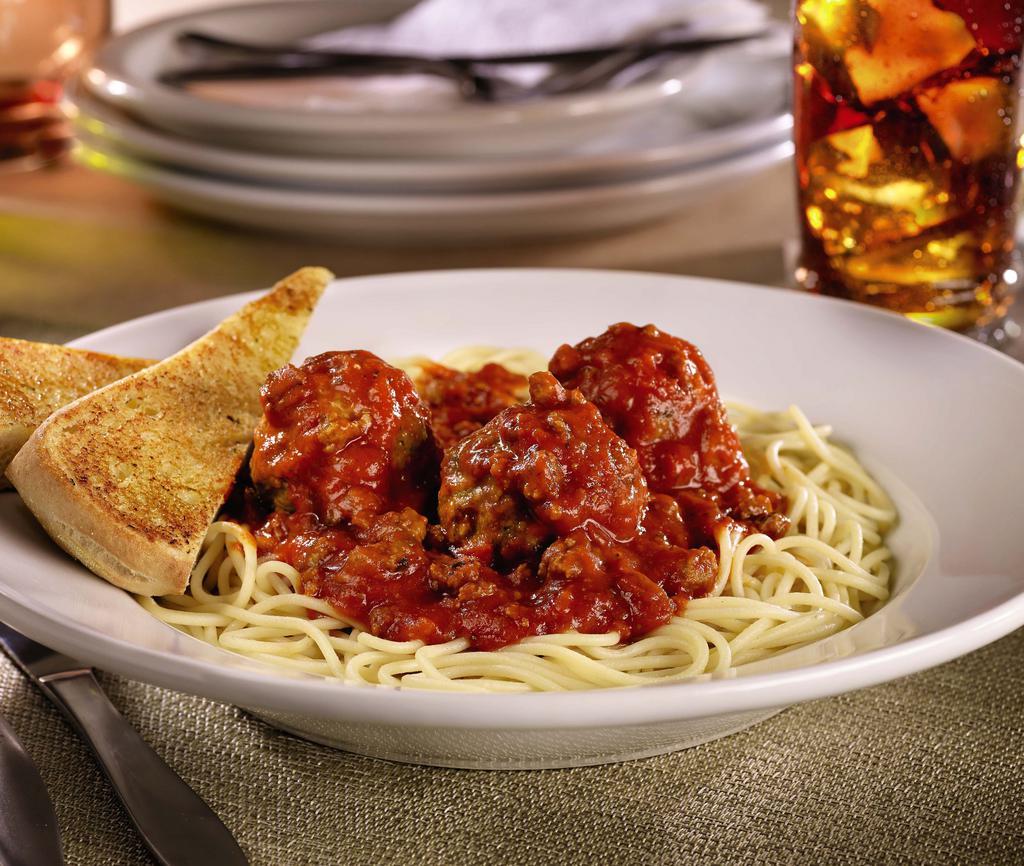 Family Spaghetti W/ Meatballs · Seasoned meatballs (12) atop a bed of fresh delicious pasta covered in marinara sauce.  Served with a family sized fresh green salad and choice of dressing and garlic bread.  Serves 4 people