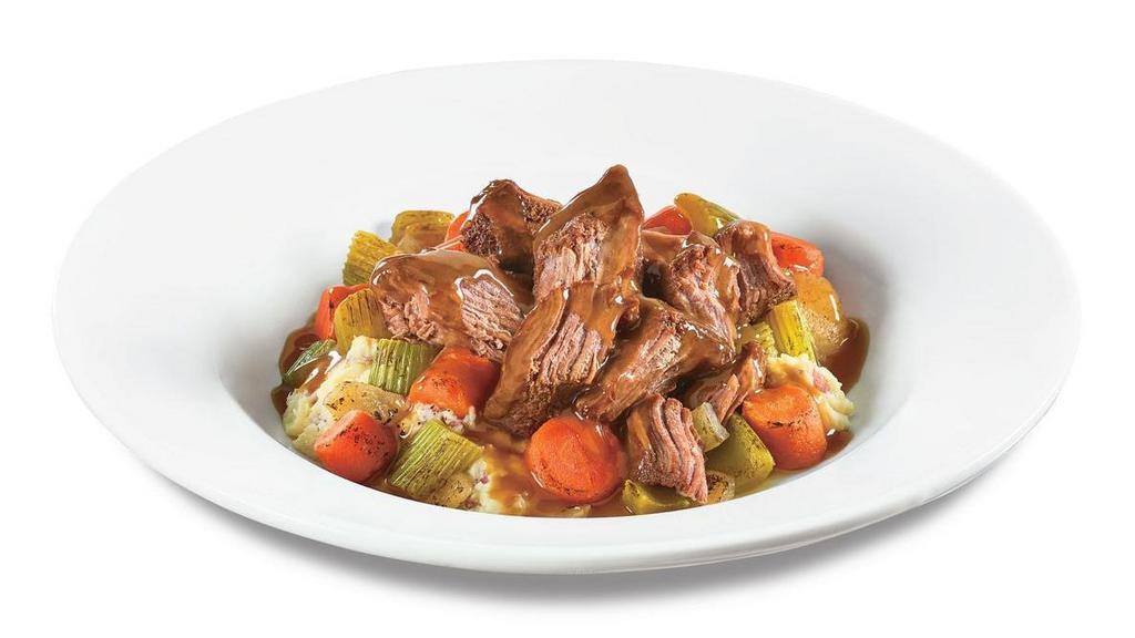 Family Pot Roast Dinner  · Slow Cooked Pot Roast atop red skinned mashed potatoes with roasted carrots, celery and onions and covered in rich brown gravy.  Served with family sized fresh green salad choice of dressing and dinner rolls. 
Feeds 4 people