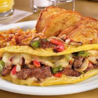 Philly Cheesesteak Omelette. · Grilled prime rib, fire-roasted bell peppers & onions, sautéed mushrooms and Swiss cheese. S...