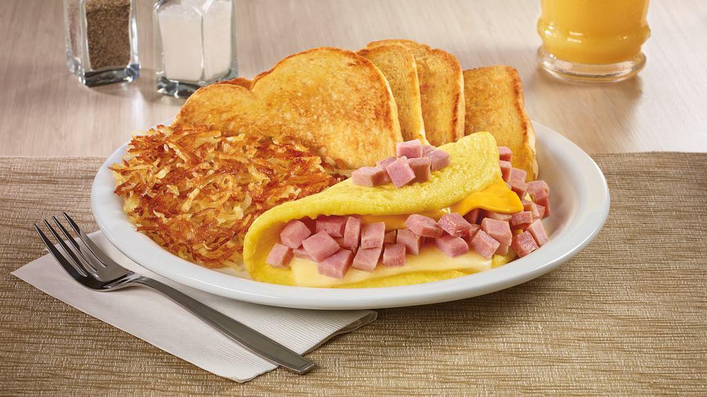 My Hammy & Cheese Omelette. · Ham with Swiss & American cheeses. Served with hash browns and choice of bread.