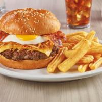 Slam Burger · Hand pressed beef patty, with hash browns, an egg, bacon, and American cheese on a brioche b...
