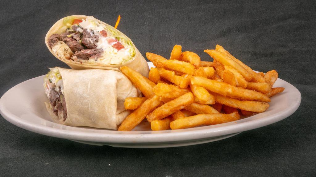 Steak And Cheese Wrap · Consuming raw or undercooked meats, poultry, seafood, shellfish, or egg may increase your risk of foodborne illness, especially if you have certain medical conditions . 

American cheese, Pico de Gallo, sour cream, and lettuce.