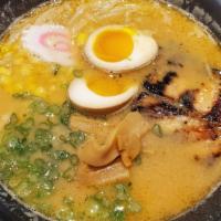 Miso Ramen · Miso based, chashu, egg,  menma, corn, naruto maki, and scallion.