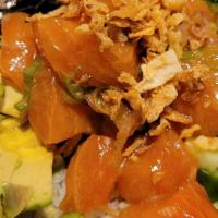 Wasabi Shoyu Salmon Poke Bowl · Hawaiian Style; Salmon with Goma Shoyu and Wasabi Oil, seaweed salad, avocado, cucumber, red...