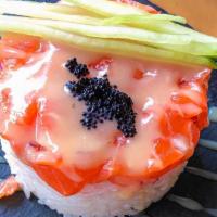 French Salmon Tartare · Chopped salmon with apple, onion and black tobiko on top. Served with yuzu soy sauce and gra...