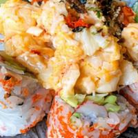 Maine Lobster Maki · Lobster boiled with spicy mayo and topped with dried bonito and tobiko.
