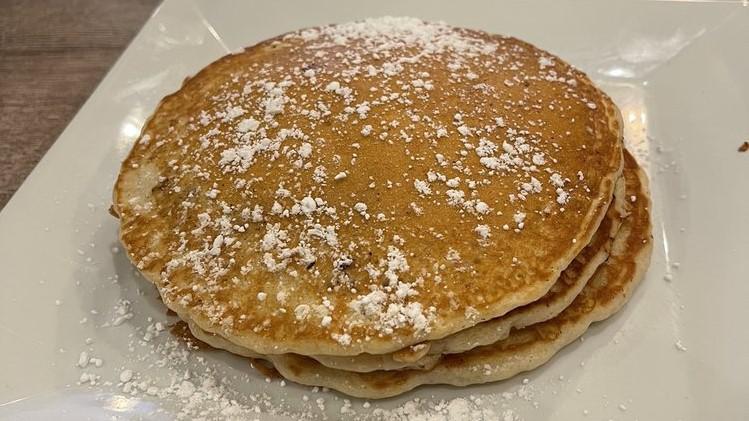 Chocolate Chip Pancakes · Stack of 3 Homemade Chocolate Chip Pancakes Served with Maple Syrup.