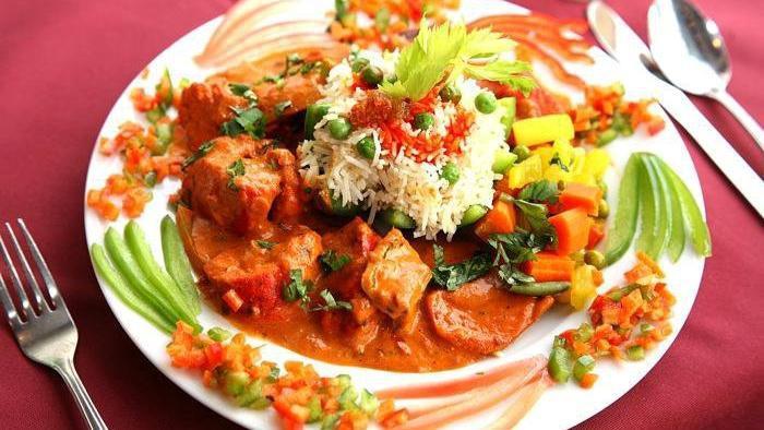 Chicken Tikka Masala · Most popular Indian entrée! Tender pieces of boneless chicken breast marinated and grilled in tandoor, cooked in flavorful creamy tomato sauce.