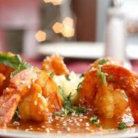 Shrimp Tikka Masala · Tender pieces of shrimp marinated and grilled in tandoor, cooked in flavorful creamy tomato ...