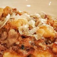 Potato Gnocchi · wild boar bolognese, rosemary