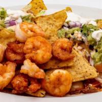 Shrimp Nachos · Tortilla chips, choice of Vegan Pinto, Black or refried Bean, Shrimp, sour cream, melted che...