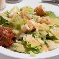 Large Caesar Salad · Romaine lettuce, shaved parmesan cheese, and croutons with caesar dressing.