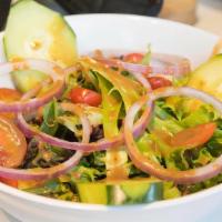 House Side Salad · Spring mix with carrots, cucumbers, cherry tomatoes, red onions, and croutons.