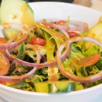 Large House Salad · Spring mix with carrots, cucumbers, cherry tomatoes, red onions, and croutons.